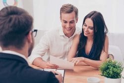 Couple looking at offer