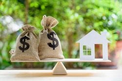 balancing money and a house